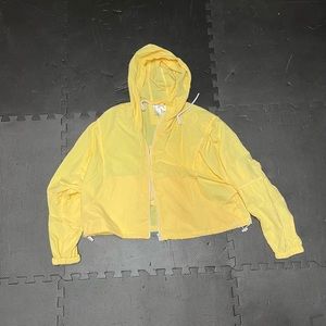 Cropped yellow windbreaker